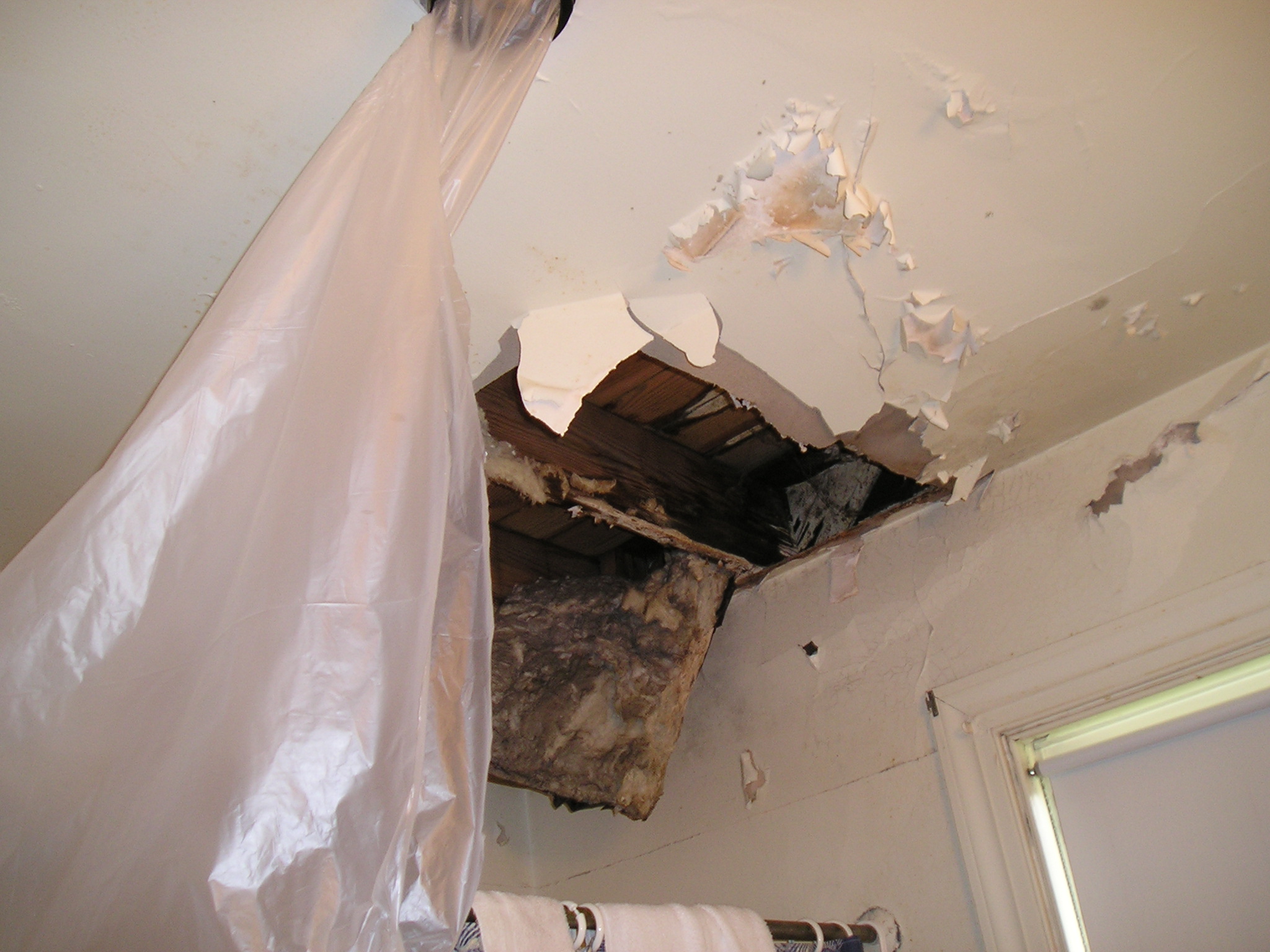 damage from leaking valley on slate roof